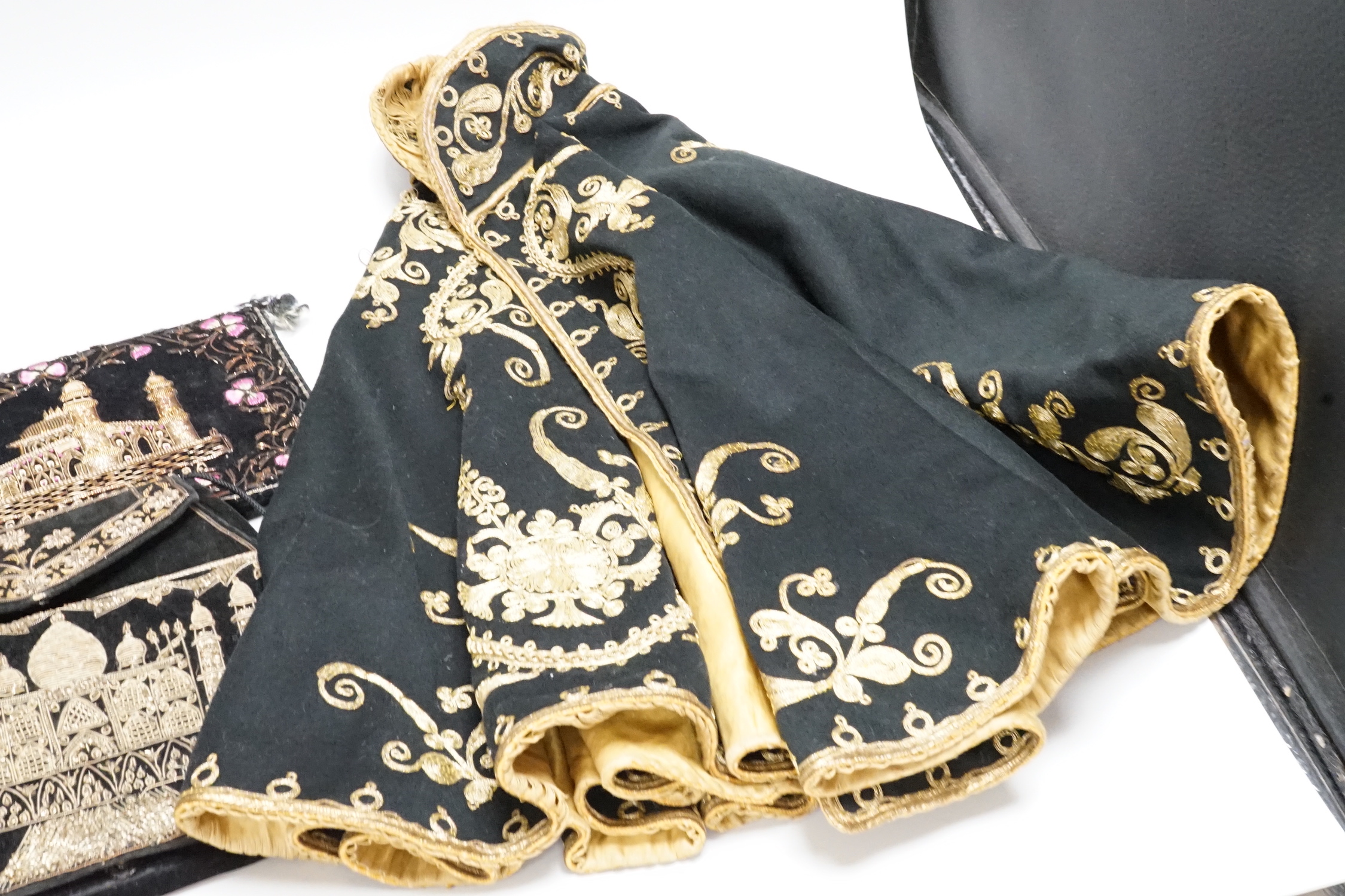 An inlaid gold thread embroidered cape and jacket and 3 bags